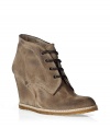 Stylish wedge booties in taupe suede - An awesome trend shoe you have to have right now - The shoe has a 10 cm (3.9) high wedge heel, it is cut ankle high and has a decorative lace-up - Fashionable crepe sole - It goes with everything thats now trendy: long maxi skirts, flared trousers, casual rolled up jeans - Narrow, absolutely comfortable and sturdy - A shoe for every day that always works