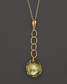 Oval freeform lemon citrine briolettes add rich sparkle to links of 14K yellow gold. By Nancy B.