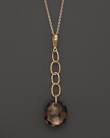 Oval freeform smoky quartz briolettes add rich sparkle to links of 14K yellow gold. By Nancy B.