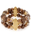 Quite a stretch. Kenneth Cole New York's stretch bracelet is crafted from gold-tone mixed metal with oval accents, as well as rows of brown glass pearls and beads for a stunning statement. Item comes packaged in a signature Kenneth Cole New York Gift Box. Approximate length: 7-1/2 inches. Approximate width: 1-1/5 inches.