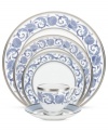 Set a tone of opulence and grace with the Sonnet in Blue place setting. Patterned platinum bands and powder-blue botanicals frame traditional bone china from Noritake.