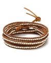 Nod to natural influences with this brown leather wrap bracelet from Chan Luu. With sterling silver accents, it's a cool combination of tone and texture.