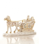 Just a sleigh ride away from the North Pole is a little village, untouched by time, called Mistletoe Park. The horse-drawn carriage is a staple of village life, and this fine example is sculpted with dashing 24-carat gold detail.