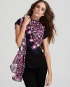 Update your look with this boldly printed silk scarf in vivid hues from DIANE von FURSENTBERG.