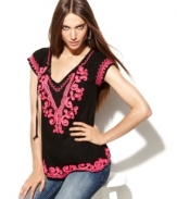 INC's embroidered tunic adds an air of relaxed glamour to any outfit! Subtle beading gives this top extra shine, too.