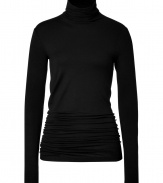 Inject a luxe edge into your casual look with Donna Karans black jersey turtleneck, detailed with a contemporary gathered back for chic, modern results - Turtleneck, long sleeves, contoured gathered back seam, asymmetrical hemline - Form-fitting, gathered silhouette - For a futuristic look, wear with jet black separates and metallic detailed accessories