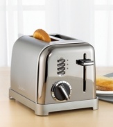 Toast your next breakfast using this sleek single-serving toaster, decked out in brilliant brushed stainless steel and classic chrome and black accents. Efficient in size, this appliance is perfect for compact kitchens. A 6-setting browning control and extra-lift carriage lever let you make toast just how you like it. Three-year warranty.