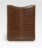 A compact, crocodile-embossed sleeve for the iPad gives a sophisticated finish to your tech device.LeatherAccommodates all iPad modelsImported