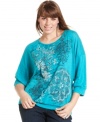 Snag a standout casual look with Style&co.'s three-quarter-sleeve plus size top, showcasing an embellished print.