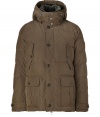 Stylish and sporty with an ultra soft fur trimmed collar, Woolrichs Pocono down parka is a must for cool weather looks - Stand-up collar with fur trim, hooded, long sleeves with tabbed cuffs, hidden two-way front zip, button panel, buttoned front patch pockets, quilted - Contemporary fit - A versatile, classic coat perfect for both city streets and country slopes