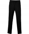 Work out without compromising on style in Ralph Laurens super soft fleece track pants - Drawstring waistband with black tie, white side stripes, zippered front slit pockets, front seams, embroidered red polo player at thigh - Straight leg - Wear with your favorite hoodie and bright sneakers