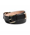 Pull together your look with a sophisticated polish and wrap around Salvatore Ferragamos jet black double-buckle calfskin belt - Double buckle closures, gold-toned hardware - A contemporary finish to casual jeans and dressy sheaths alike