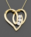 Three round-cut diamonds (1/4 ct. t.w) punch up a classic heart shape on this diamond necklace. Set in 14k gold. Chain measures 16 inches; pendant measures 3/4 inches.