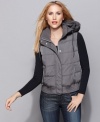 Layer your winter look with Calvin Klein's hooded vest. A wind resistant placket makes it just right for shielding yourself from the elements. (Clearance)