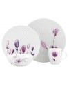 Blur the line between garden style and modern design with the Watercolors Amethyst saucer. Purple blossoms flourish against a playful dot pattern while the white coupe shape couples the sleek look and unparalleled durability of bone china. Qualifies for Rebate