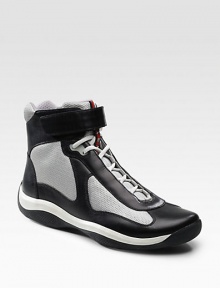 Leather and mesh with hook-and-tab ankle closure. Padded insole Rubber sole Imported 