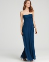 Master streamlined elegance in this Amsale strapless gown, flaunting a famously flattering empire waist.