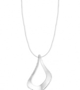 Go to even greater lengths with this necklace from Robert Lee Morris. Crafted from silver-tone mixed metal, the necklace dazzles with a sculptural pendant adorned with glass pave crystal accents. Approximate length: 24 inches + 3-inch extender. Approximate drop: 2-1/2 inches.