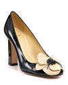 A leather flower adorns the toe of the Zaria pump, a feminine creation from kate spade new york.