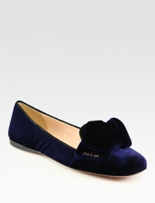 Velvet flat slipper with contrast suede trim and bow detail. Velvet upper with suede trimLeather lining and solePadded insoleMade in Italy