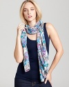 Warm up your spring ensemble with a light and airy scarf featuring a gorgeous floral print.