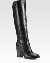 Sleek lines define this paneled leather boot, with easy elastic gores and a stacked heel. Stacked heel, 3¾ (95mm)Shaft, 15Leg circumference, 13½Leather upper with back elastic goresPull-on styleLeather liningRubber solePadded insoleImported