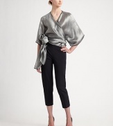 Metallic, silk blend, rendered in a wrap front kimono style with a dramatic, sculptural side tie.Surplice necklineWide three-quarter kimono sleevesWrap front with side tie74% viscose/26% silkDry cleanMade in Italy of imported fabricModel shown is 5'10 (177cm) wearing US size 4. 