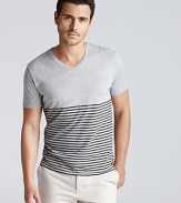 An emboldened basic from Vince--this striped, color block t-shirt is an essential wardrobe staple.