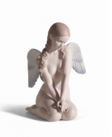 Radiating beauty is the theme of this special figure. Beautifully crafted and marked by careful detail, this innocent angel appears pensive and quiet basking in glowing light.