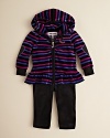 Juicy Couture updates the velour hoodie and pant look with vivid stripes and generous ruffle accents at the hem.