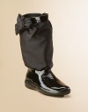 Tech fabric with crinkled patent leather finished with a bow on the side.Rubber sole Side zipper Imported