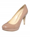 Round out your look with the darling silhouette and high-shine finish of the Dixy platform pumps by Enzo Angiolini.