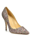 Glitz and glam and glitter, too. These pointy-toe pumps steal the spotlight with every step. By kate spade new york.