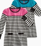 A bright, striped tunic from Takeout, made with just a touch of stretch fiber so she can wear it all day long.