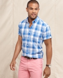 Prep up your seasonal look with this plaid short-sleeved shirt from Tommy Hilfiger.