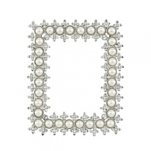 Delicate frame with faux pearls and Swarovski® crystals in a silver-tone metal finish.