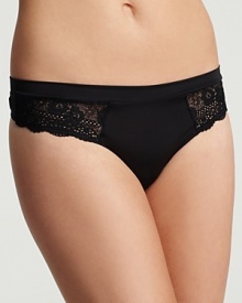 A stylish thong with sheer lace detail at hips from OnGossamer.