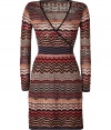 Add a playful punch to you chic workweek look with Missoni Ms characteristic knit wrap dress, a contemporary take on the brands iconic look - Wrapped V-neckline, long sleeves, contrast patterned trim, pull-over style, black half-slip lining - Fitted - Wear with flats and an oversized carryall tote for work, or dress up for cocktails with a fur coat and heels