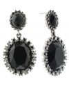 Effortlessly elegant. A dramatic double-drop silhouette stands out stylishly on these 2028 earrings. Adorned with faceted acrylic jet stones, they're set in hematite tone mixed metal. Approximate drop: 2 inches.