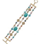 Glass pearls and reconstituted turquoise beads add an elegant finish to this three-row bracelet from Lauren Ralph Lauren. Ring and toggle closure. Crafted in 14k gold-plated mixed metal. Approximate length: 7-1/2 inches.