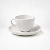 Borrowing from nature, this Pebblestone espresso cup and saucer is metaphorically contoured and highly glossed in straightforward colors. The silhouette, a DVF signature, makes tables shine. Create interesting contrasts or pair with perfect matches.