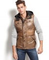 Look edgy while staying warm with this distressed metallic look puffer vest by Guess Jeans.