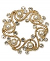 Regal and lovely, this golden wreath pin from Jones New York grabs attention with faux-pearls and glass accents. Crafted in gold tone mixed metal. Approximate length: 2 inches. Includes a gift box.