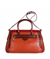 Detailed in rich autumnal shades with a practical belted shoulder strap, Marc by Marc Jacobs colorblocked leather bag is a cool way to flaunt your new season style - Zippered front pocket with turnlock zipper detail, embossed leather logo, top zip closure, belted shoulder strap, two-tone double top handles, inside zippered back wall pocket, two front wall slot pockets - The perfect amount of color to uplift dark-hued outerwear