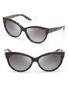 A sultry leopard print adds extra feline appeal to the cat eye silhouette in these fashion-forward Dior sunglasses.