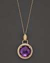 An expertly rendered faceted round amethyst pendant set in 14 Kt. gold, with fine link chain.