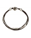 Stay true to your hippie side in free-spirited design by Fossil. This earthy bracelet features brown leather cords accented by silver tone mixed metal nugget beads and a button clasp. Approximate length: 7-1/2 inches.