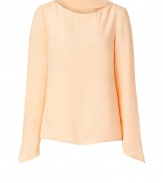 Take a minimalist stance on sophistication in Tara Jarmons nude tunic top, complete with asymmetrical cuffs for an understated modern finish - Rounded-neckline, long sleeves, slim silhouette - Style with skinny jeans, tailored business separates, or cropped trousers, and finish with ballerinas or sky-high pumps