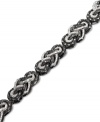 Add a new twist to your look in chic, contrasting colors. This braided bracelet will add extra dazzle to any outfit with round-cut white diamonds (2 ct. t.w.) and round-cut black diamonds (1-1/5 ct. t.w.). Set in sterling silver. Approximate length: 7-1/4 inches.