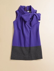 Rendered in Italian ponti jersey, this sleeveless, colorblocked frock has a fancy, frilly bowneck.Turtleneck with fixed bowSleevelessHidden back zipperViolet: 85% viscose/11% nylon/4% elastaneSlate: 98% viscose/2% elastaneDry cleanMade in the USA of imported fabric